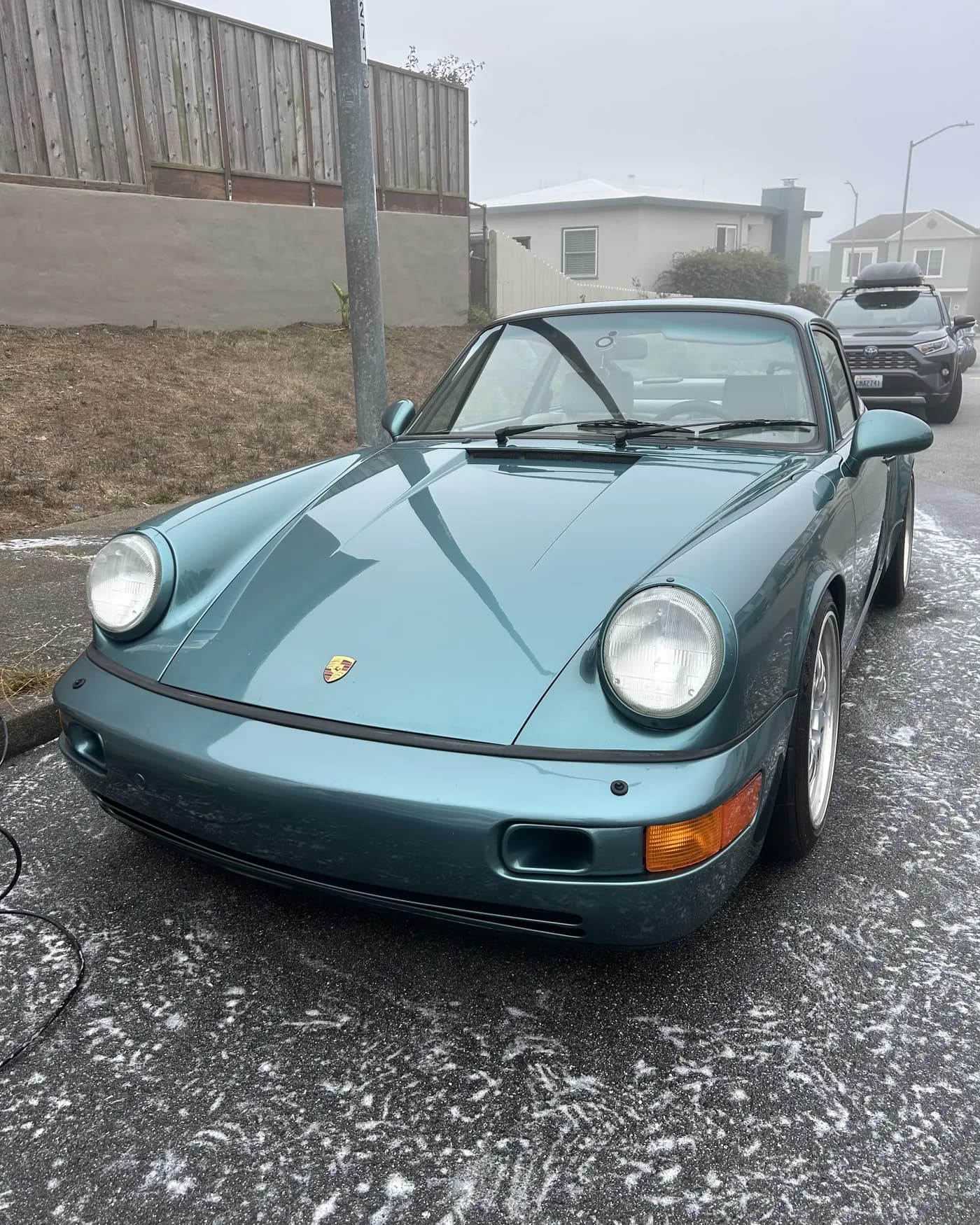 Porsche 964 after detailing, front three-quarter view